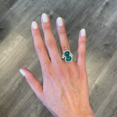 6.42 Carat Double Emerald Bypass with Diamond Halo Ring Platinum