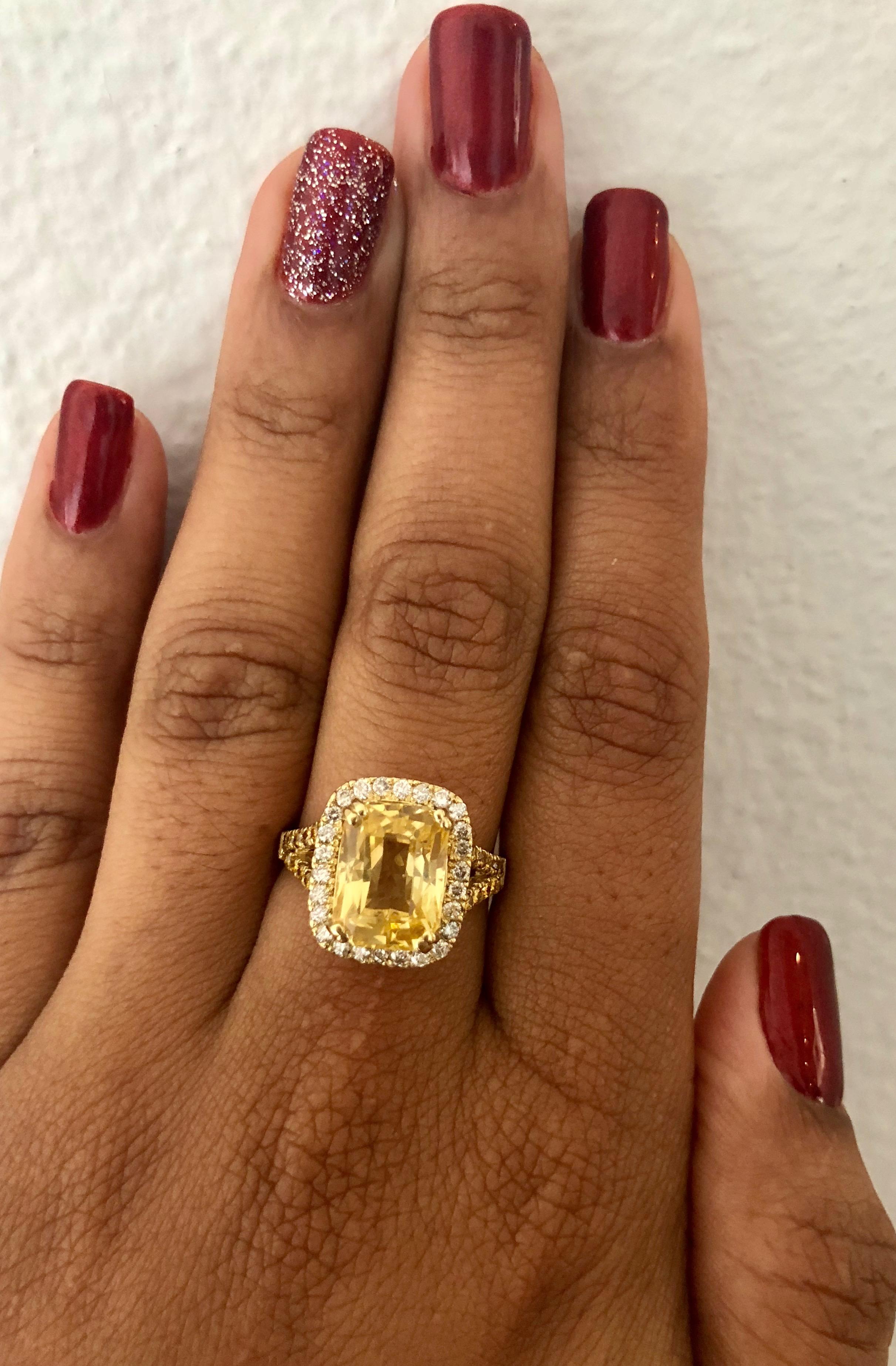 Women's 6.42 Carat GIA Certified Yellow Sapphire and Diamond 18 Karat Yellow Gold Ring