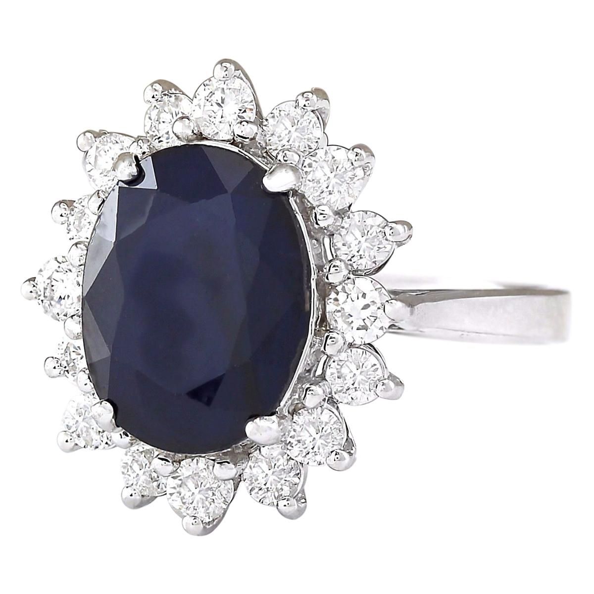 Stamped: 14K White Gold
Total Ring Weight: 8.6 Grams
Total Natural Sapphire Weight is 5.52 Carat (Measures: 11.00x9.00 mm)
Color: Blue
Total Natural Diamond Weight is 0.90 Carat
Color: F-G, Clarity: VS2-SI1
Face Measures: 17.80x15.05 mm
Sku: