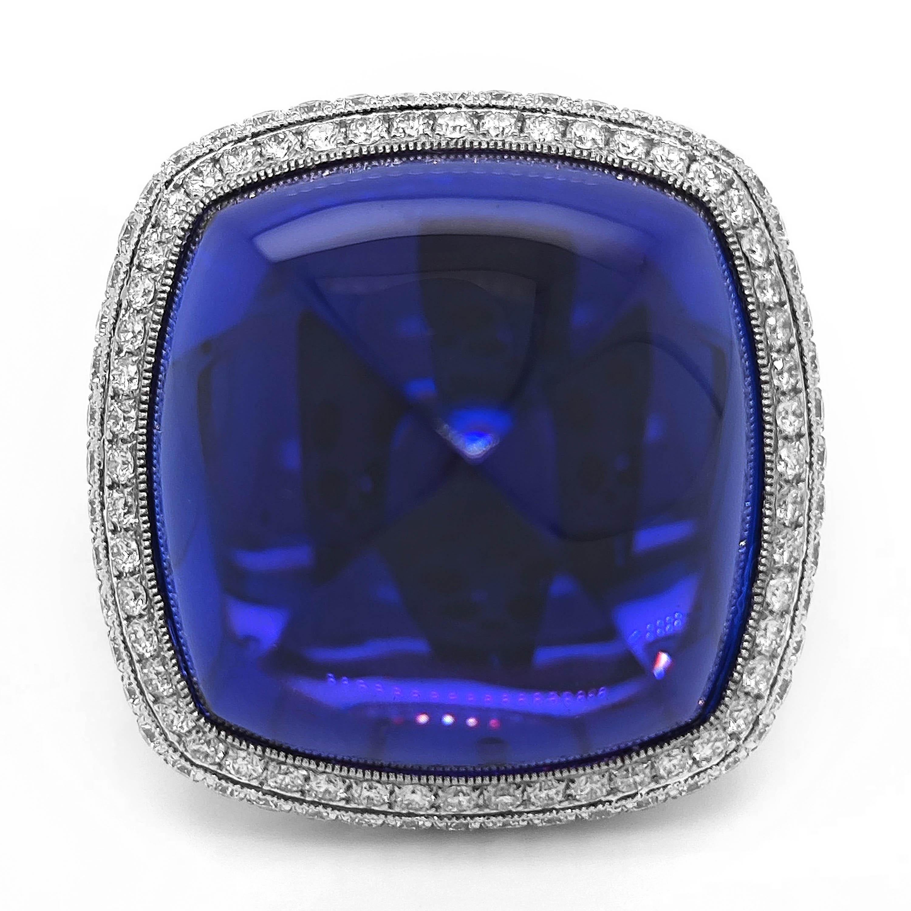 1 Tanzanite Gemstone: 61.08 Carats
20 White Round Diamonds: 0.24 Carats
148 White Round Diamonds: 2.88 Carats
Metal: 18K White Gold, 15.60 Grams
