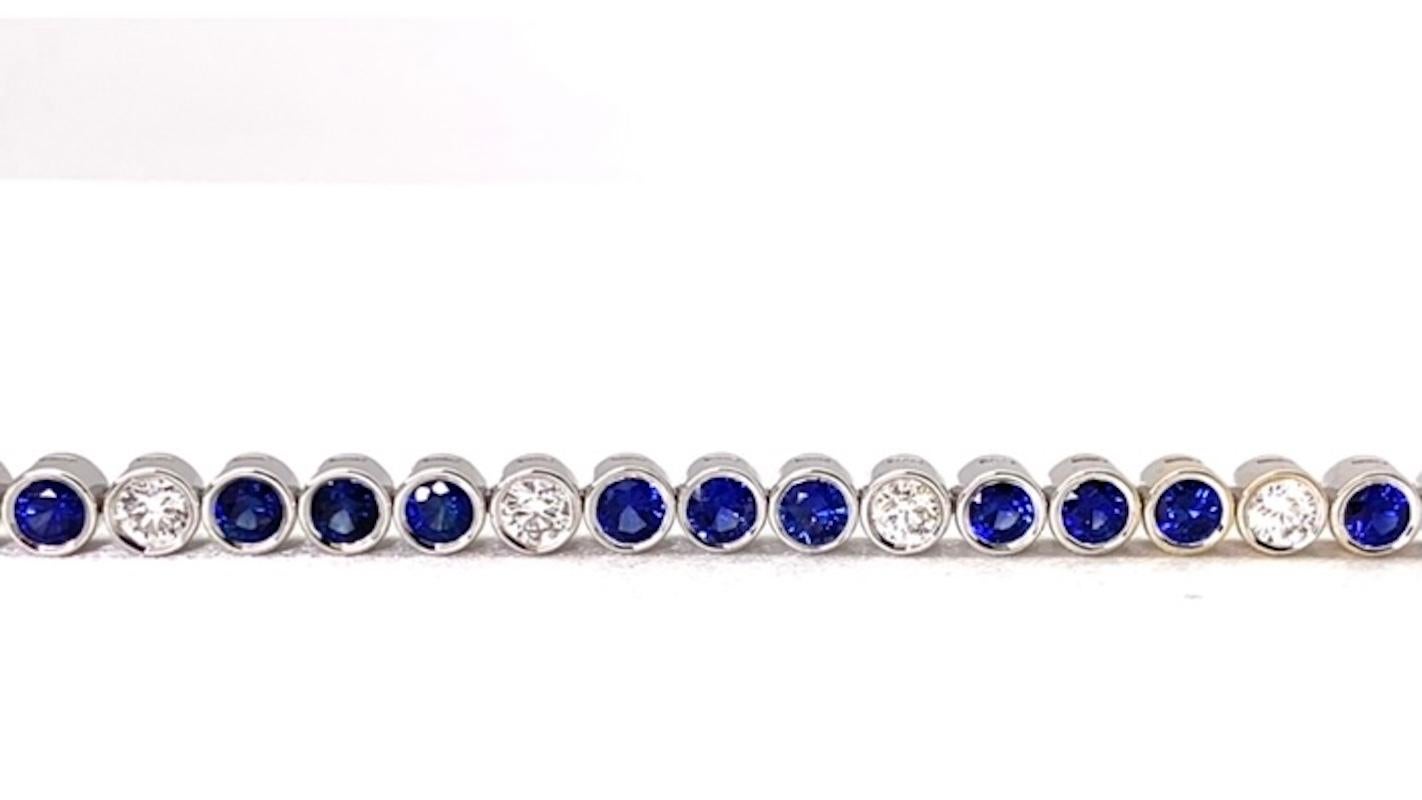 Round Cut Blue Sapphire and Diamond Tennis Bracelet, White Gold Bezel, 6.42 Carats Total For Sale