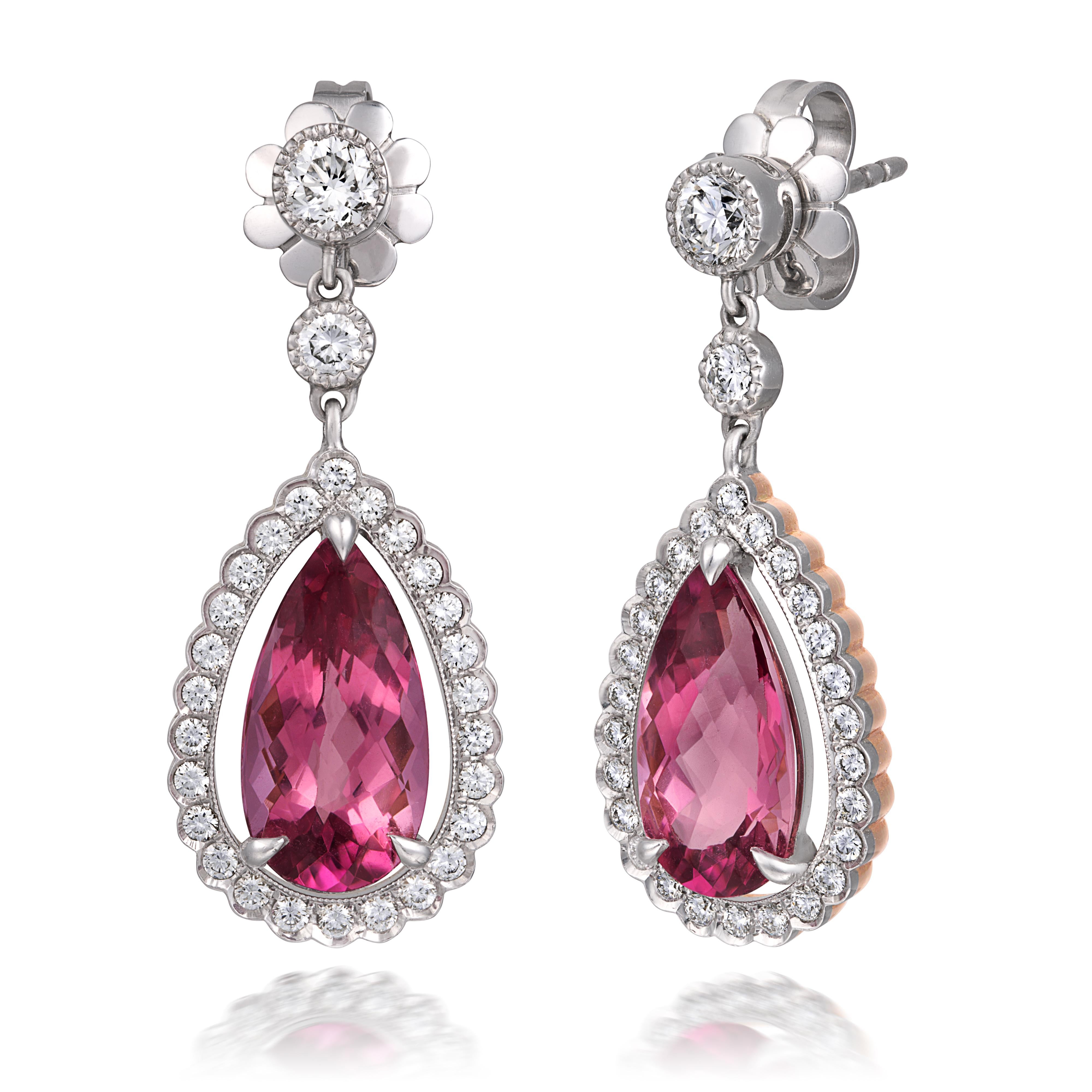 Experience the allure of these teardrop-shaped earrings, adorned with 6.42 carats of Pink Tourmaline and Diamonds. The Platinum and 18K Yellow Gold setting, embellished with Diamonds, harmoniously merges modern craftsmanship with timeless elegance.