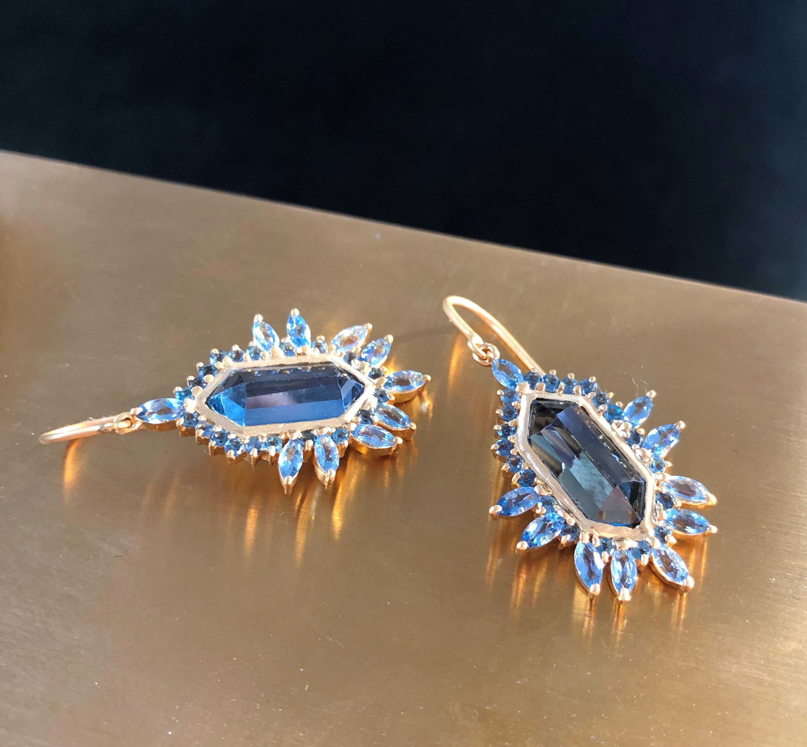 Designed by Lauren Harper, these faceted London Blue Topaz and Aquamarine 18kt Gold earrings are hand made with beautiful, vibrant and high quality stones. Solid 18kt matte Gold. Perfect finishing touch to every outfit, and lightweight enough for