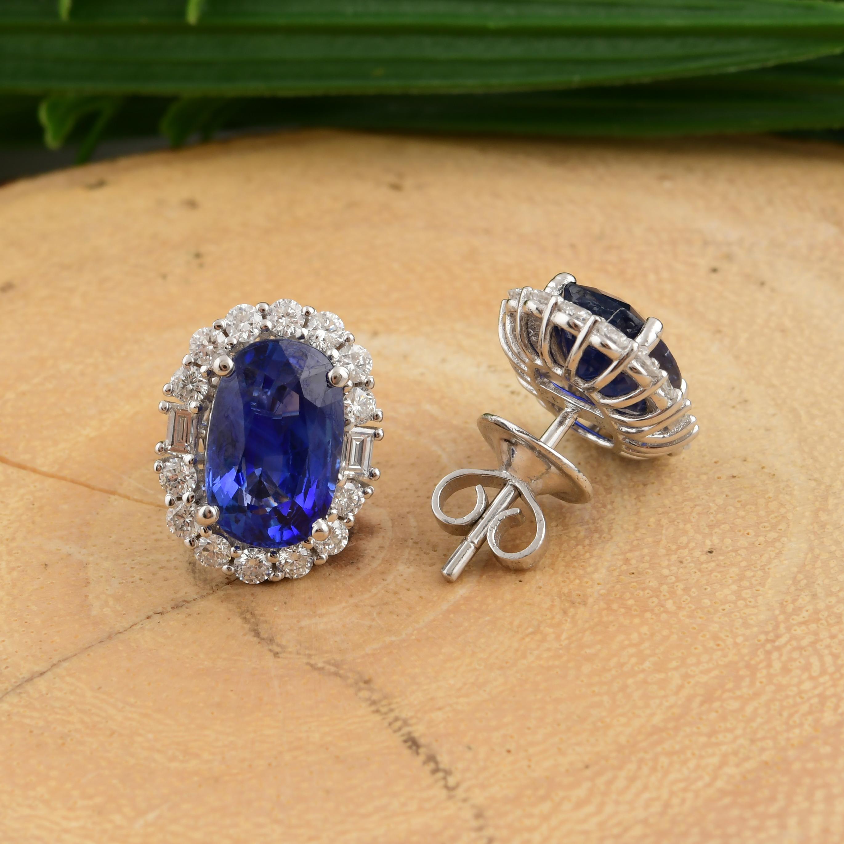 Cast from 18-karat gold, these exquisite earrings are handset with 6.42 carats of blue sapphire and 1.02 carats of sparkling diamonds. Blue Sapphire is a September birthstone and is believed to enhance mental clarity and communication skills. A