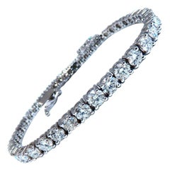 Bracelet « tennis » en diamants naturels de 6,43 carats, en or 14 carats, modèle classique à calibres dégressifs*