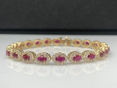 6.43 Carat Oval Cut Ruby and Diamond Halo Bracelet in 14K Yellow Gold