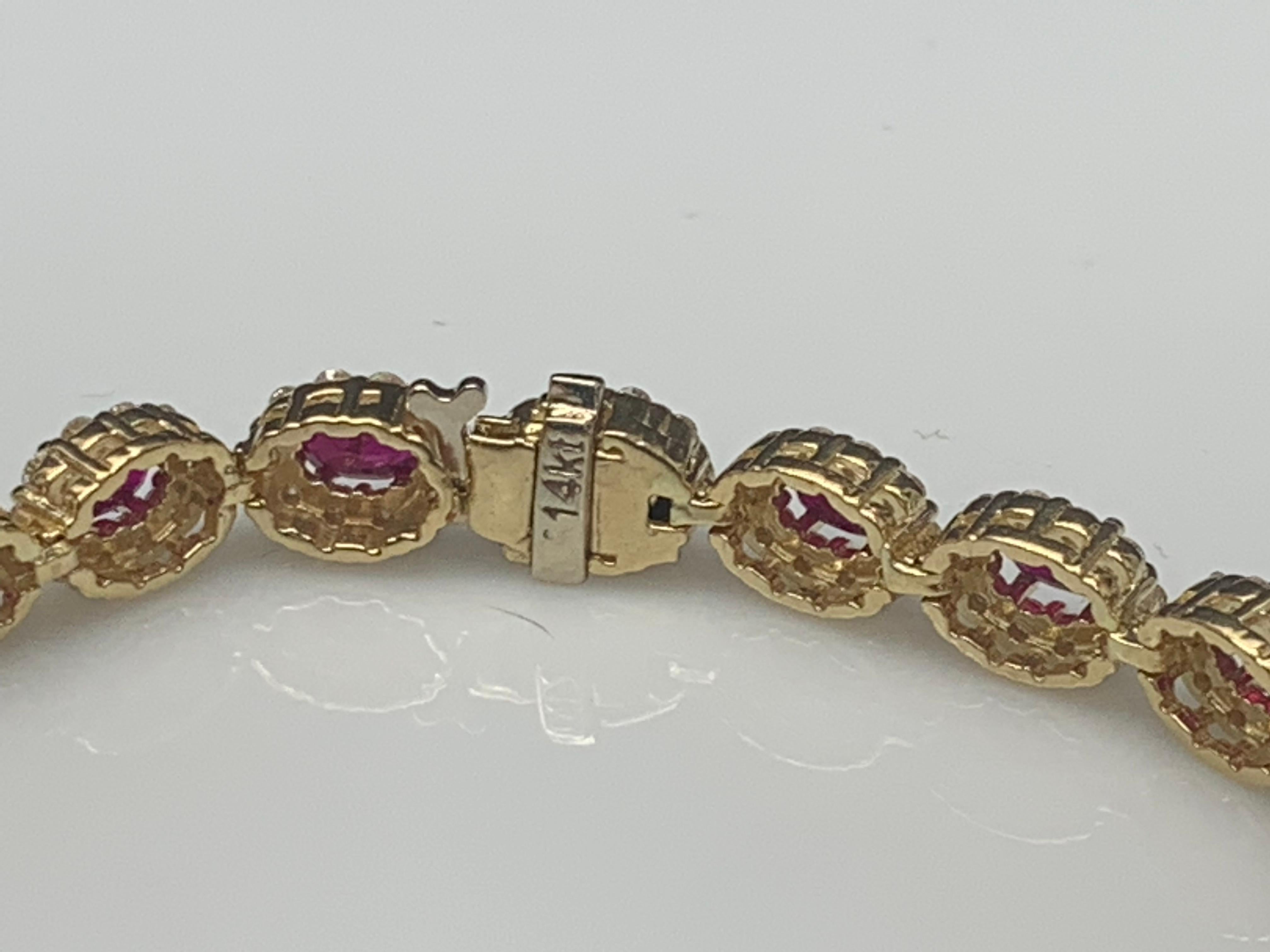 6.43 Carat Oval Cut Ruby and Diamond Halo Bracelet in 14K Yellow Gold In New Condition For Sale In NEW YORK, NY