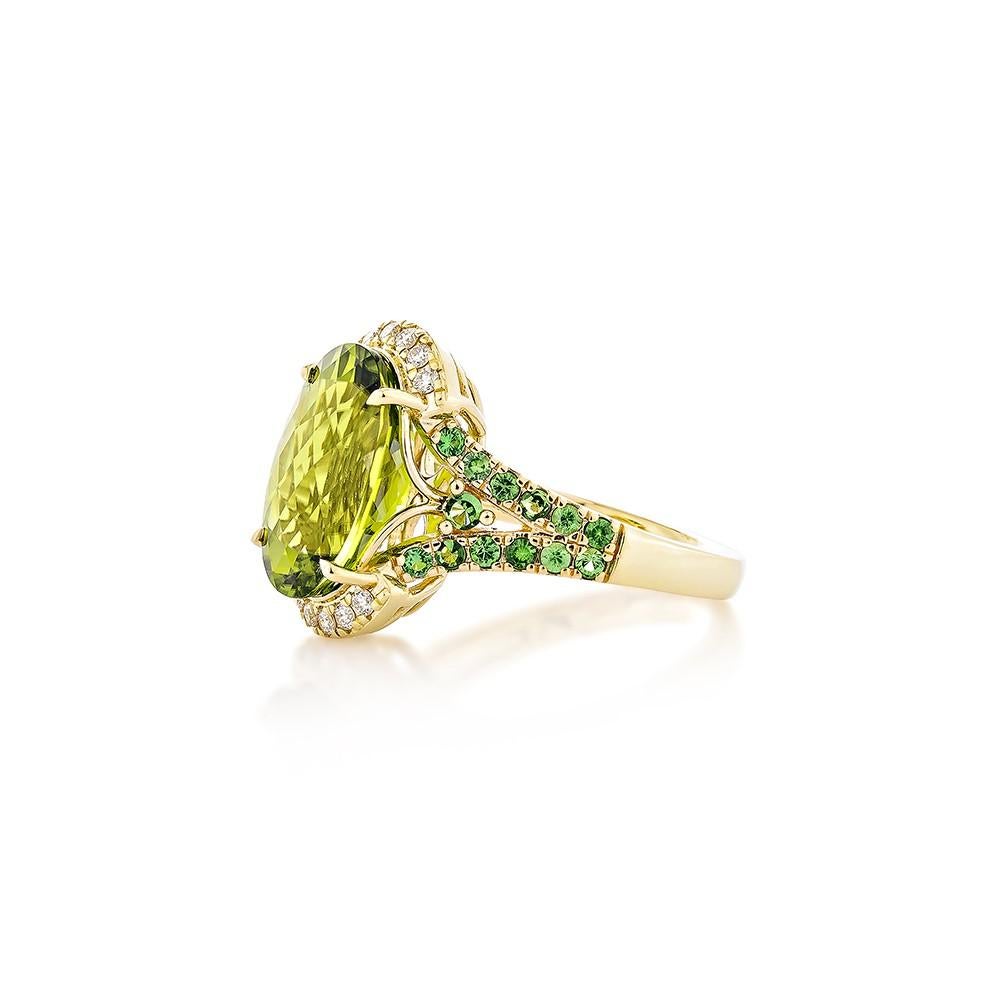 Oval Cut 6.43 Carat Peridot Fancy Ring in 18KYG with Tsavorite and White Diamond.   For Sale
