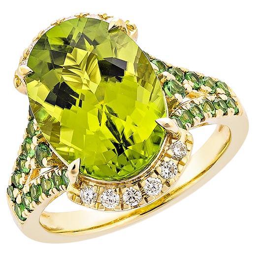 6.43 Carat Peridot Fancy Ring in 18KYG with Tsavorite and White Diamond.   For Sale