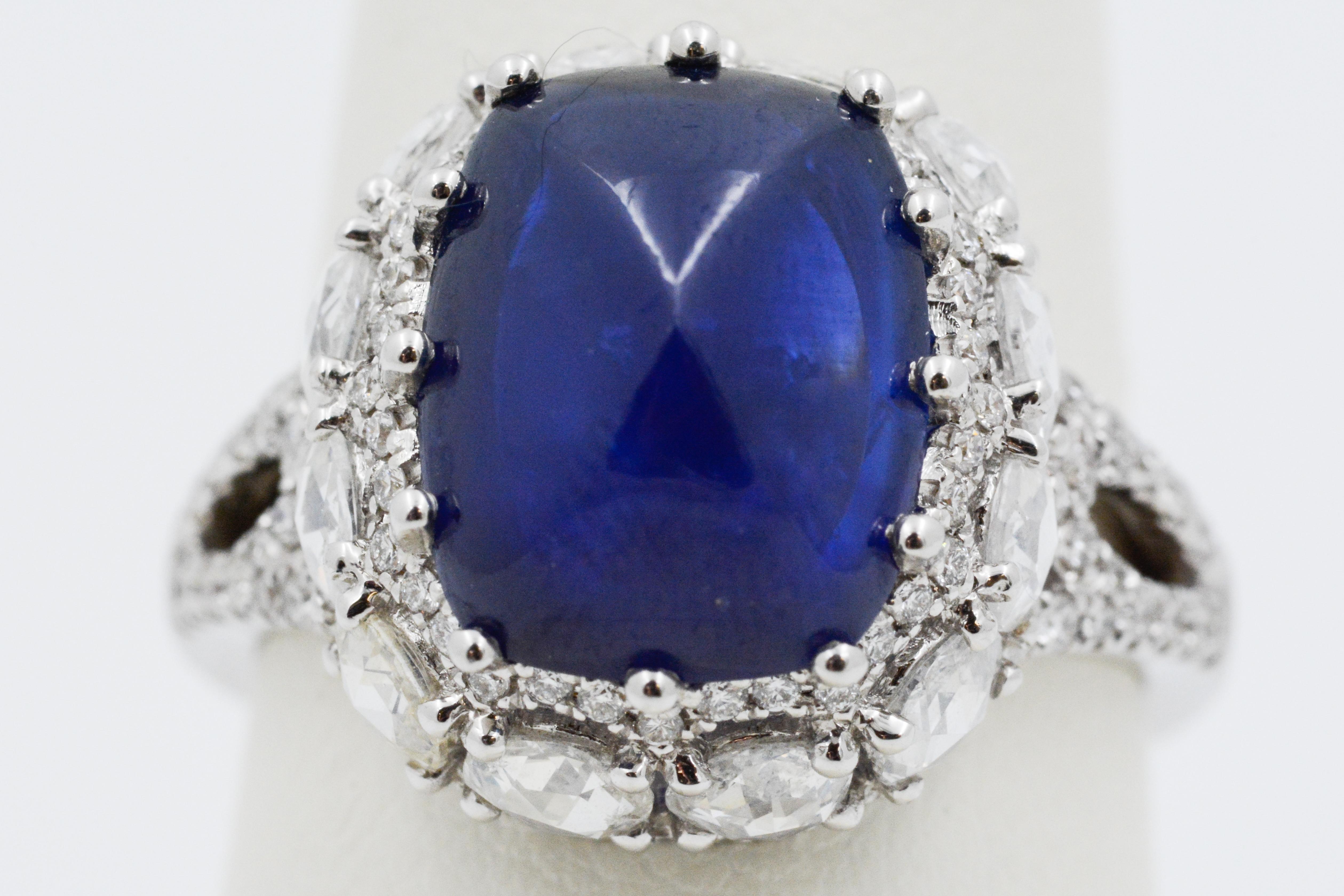 Modern 6.44 Carat Blue Sapphire Sugar Loaf and Diamond Ring
