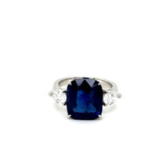 6.44 Carat Cushion cut Blue Sapphire and Diamond Three-Stone Platinum Ring