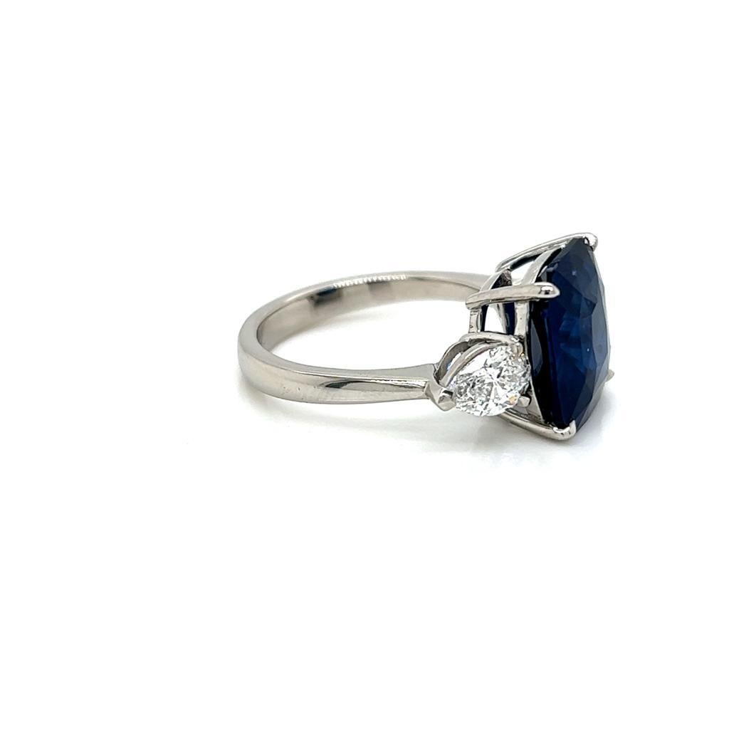 Cushion Cut 6.44 Carat Cushion cut Blue Sapphire and Diamond Three-Stone Platinum Ring For Sale