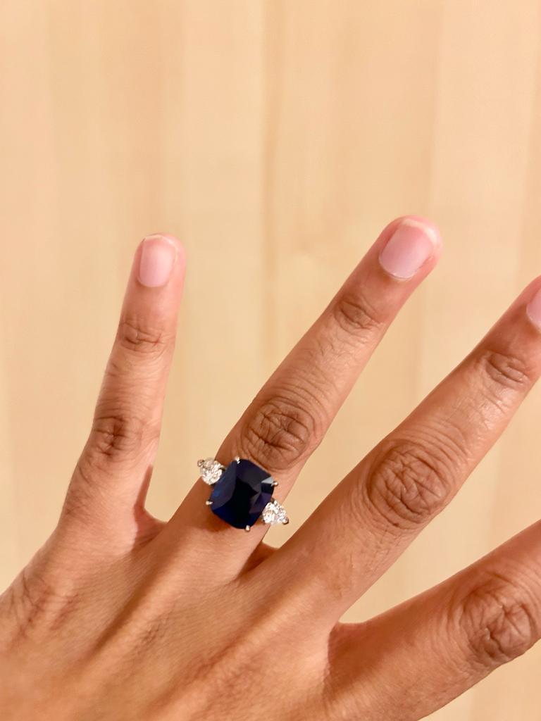 Women's 6.44 Carat Cushion cut Blue Sapphire and Diamond Three-Stone Platinum Ring For Sale