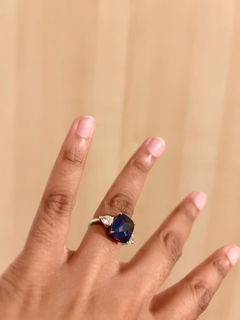 6.44 Carat Cushion cut Blue Sapphire and Diamond Three-Stone Platinum Ring For Sale 1