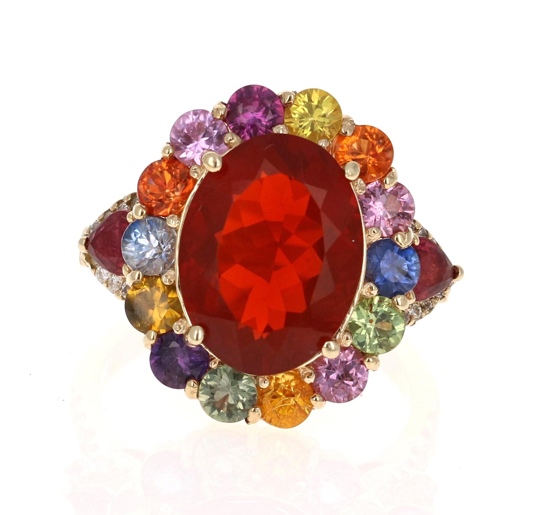 Super gorgeous and uniquely designed 6.44 Carat Fire Opal and Multi-Colored Sapphire and Diamond 14K Yellow Gold Cocktail Ring!

This ring has a 3.48 carat Oval Cut Fire Opal as its center stone and is elegantly surrounded by 14 Round Cut