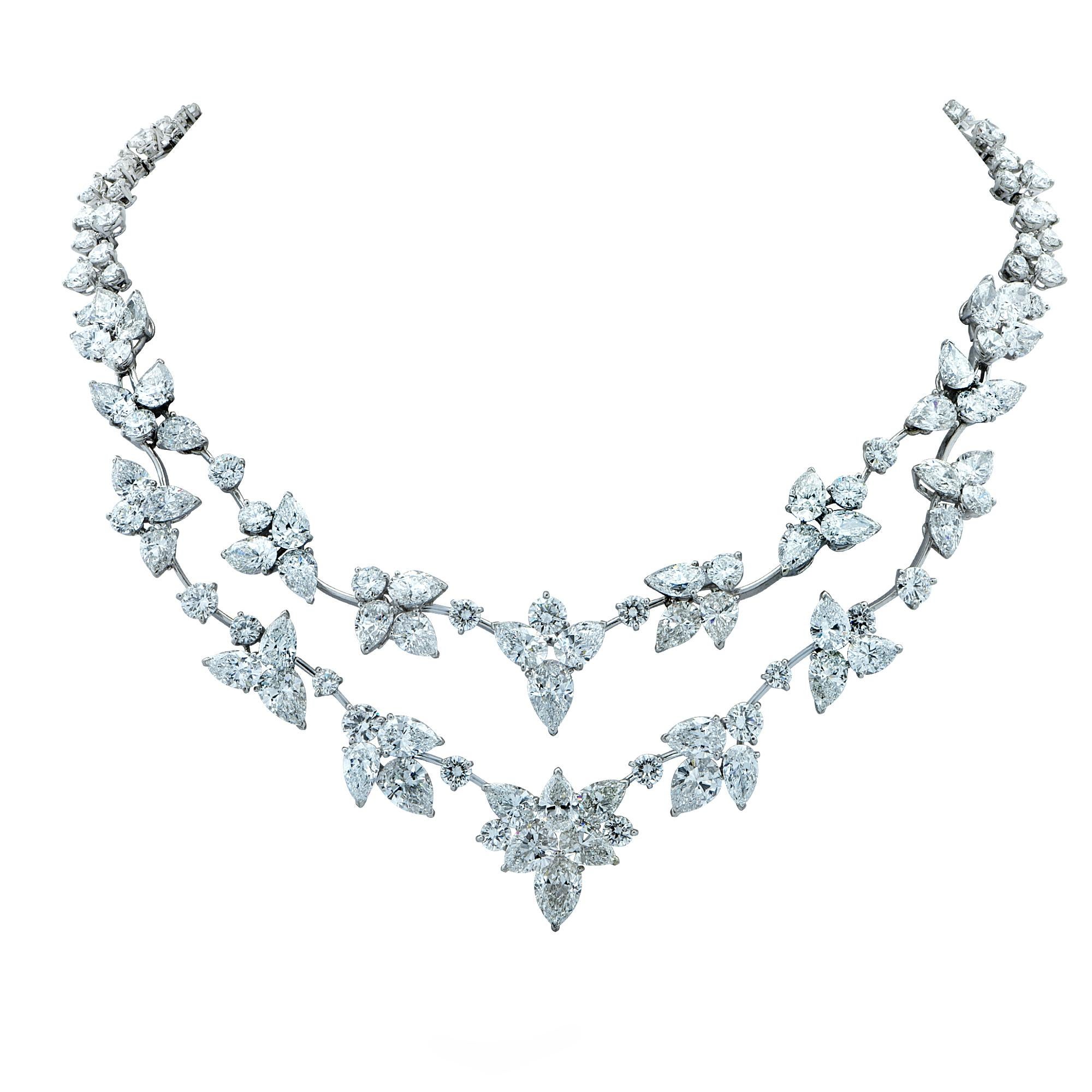 Breathtakingly beautiful diamond necklace crafted in Platinum showcasing a melange of collection diamonds weighing approximately 64.45 carats total weight. This stunning piece features 51 pear shaped diamonds weighing approximately 38.97 carats,
