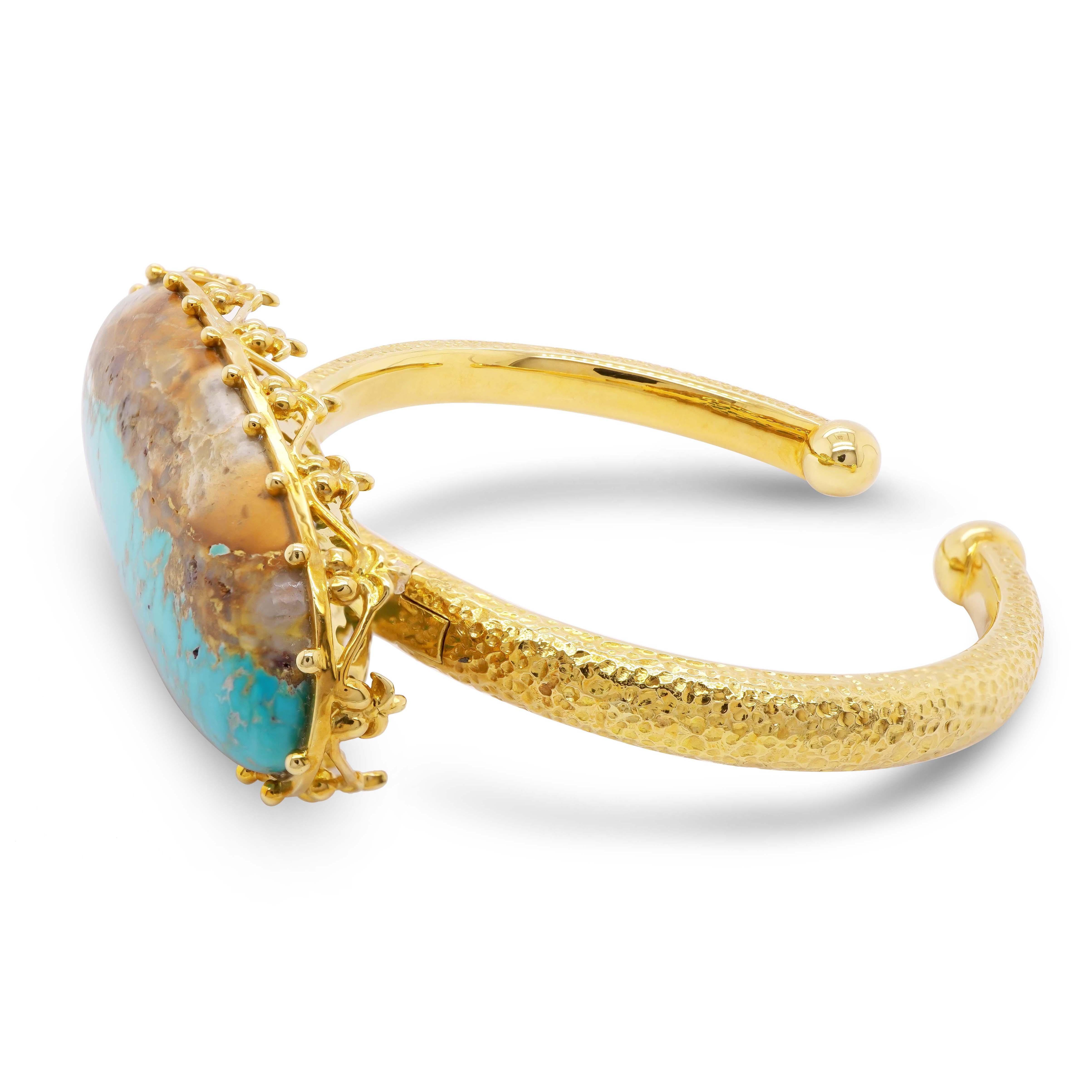 This bangle is handcrafted with a 64.45-carat turquoise gemstone.  Turquoise, to many who are unaware, is primarily a gemstone, although it is now most commonly referred to as the color of the sea or sky.  It is a gemstone that has been for jewelry