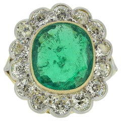 6.45 Carat Colombian Emerald and Diamond Cluster Ring