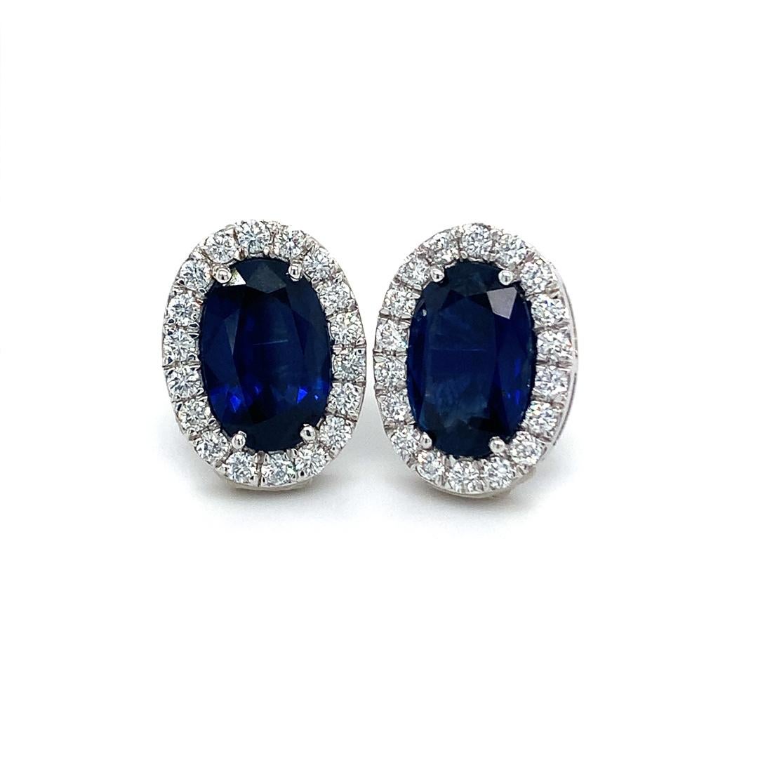 6.45 Carat Natural Blue Sapphire studs with Diamond halo In New Condition For Sale In New York, NY