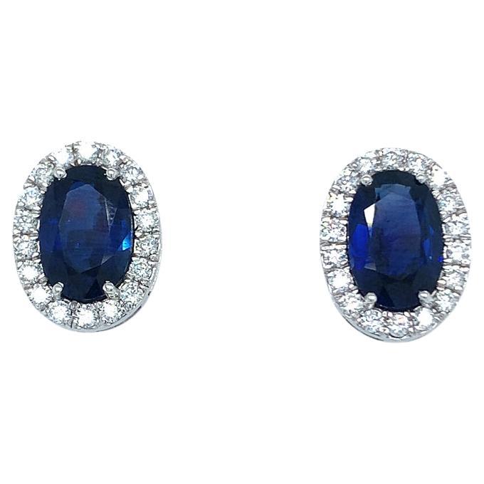 6.45 Carat Natural Blue Sapphire studs with Diamond halo For Sale