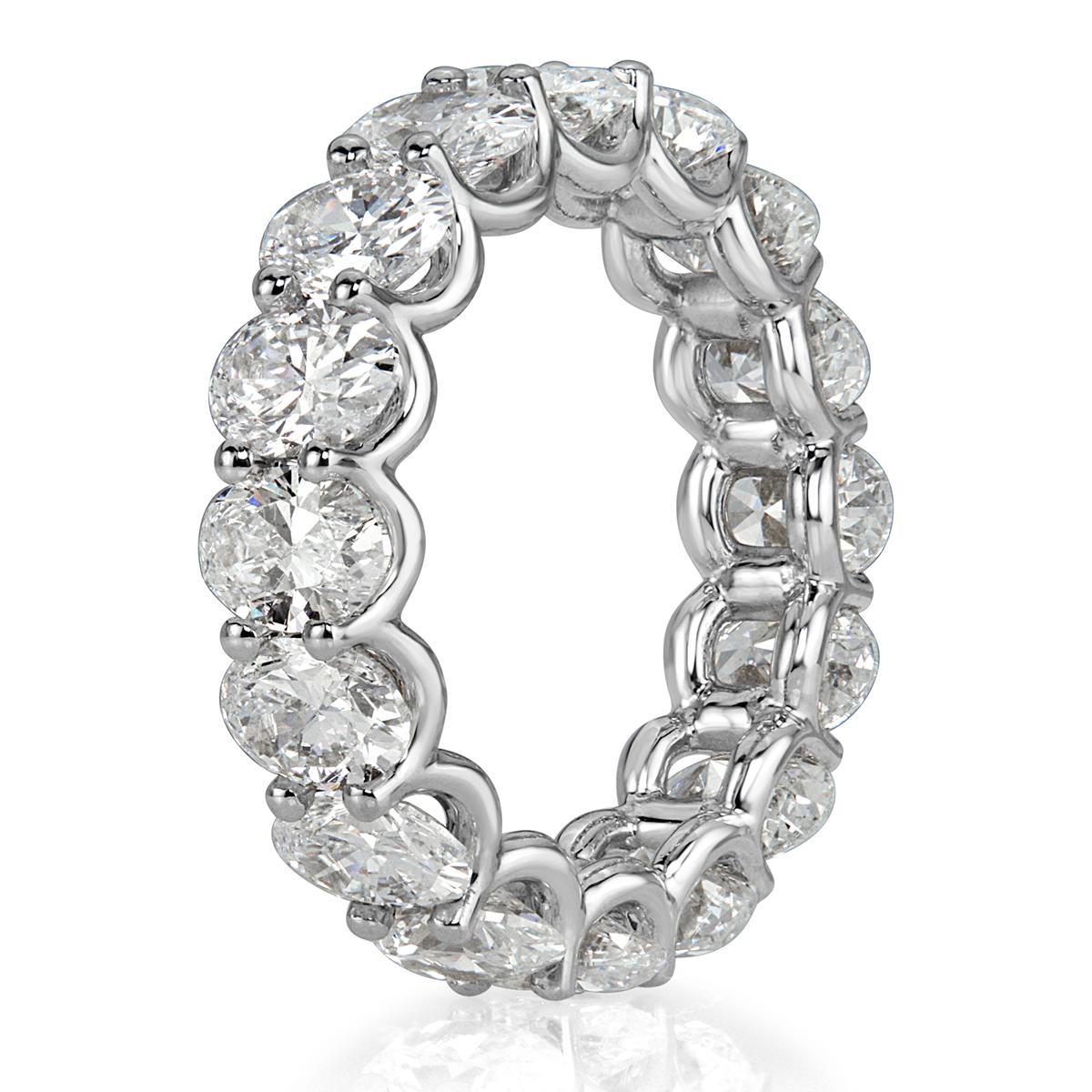 This stunning diamond eternity band showcases 6.45ct of oval cut diamonds graded at E-F, VS1-VS2. The diamonds are set in an 18k white gold, 