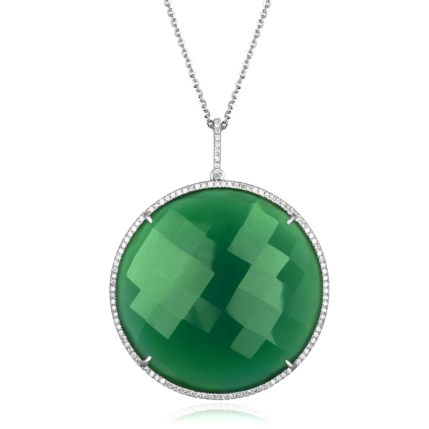 Beautiful Large Green Agate Pendant On A Chain.
The pendant is 18K White Gold.
The stone is Green Agate 64.54Ct
There are 0.68 Ct in Diamonds H SI
The pendant comes with a 18K White Gold Chain.
The chain measures 16