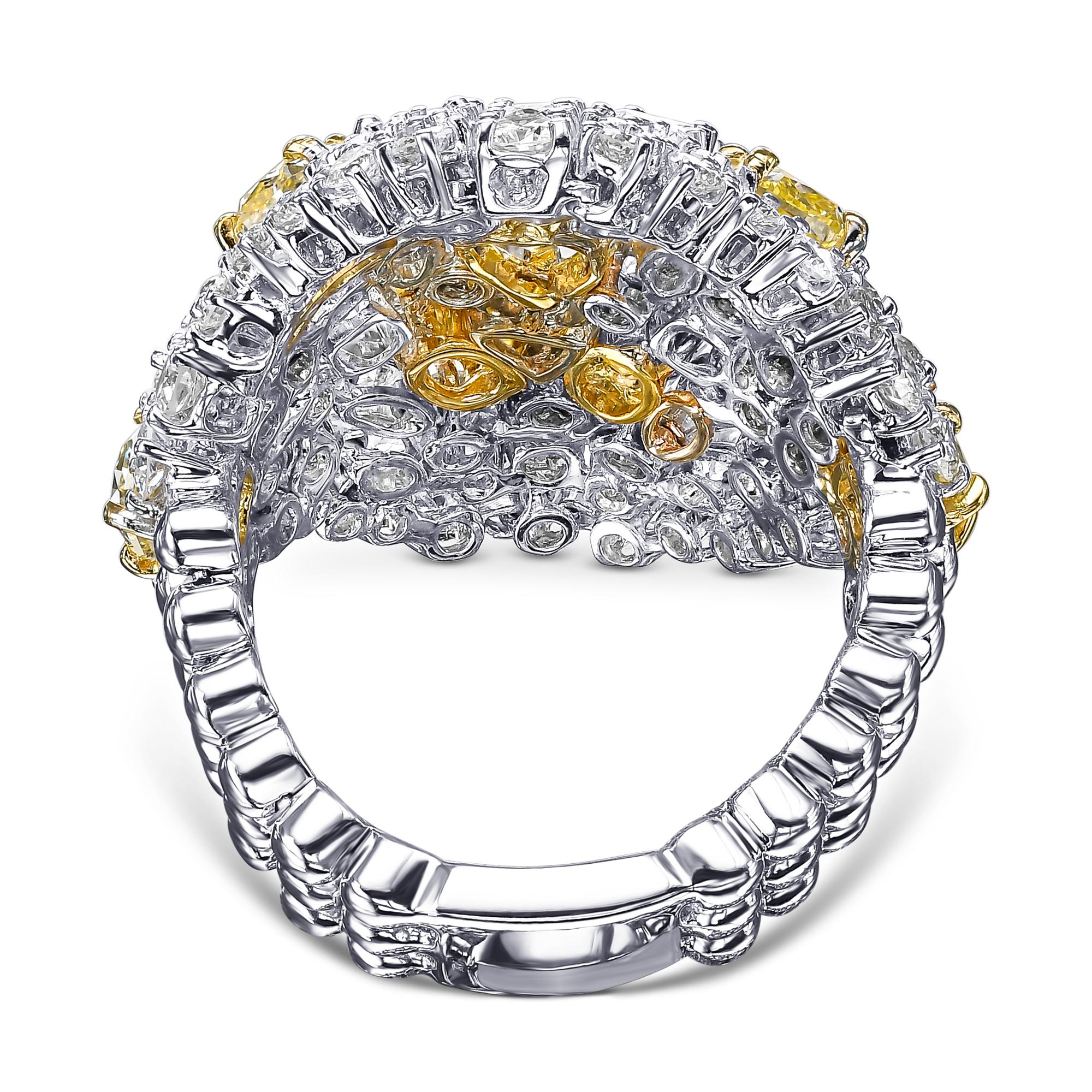 One 18K/750 white gold ring, set with 11 natural fancy yellow diamonds accented by 62 colorless diamonds. A perfect gift for yourself or your loved one!
Center stone is 1ct!

Center Stone:
___________
Natural Diamond
Cut: Multiple Shapes
Carat: 