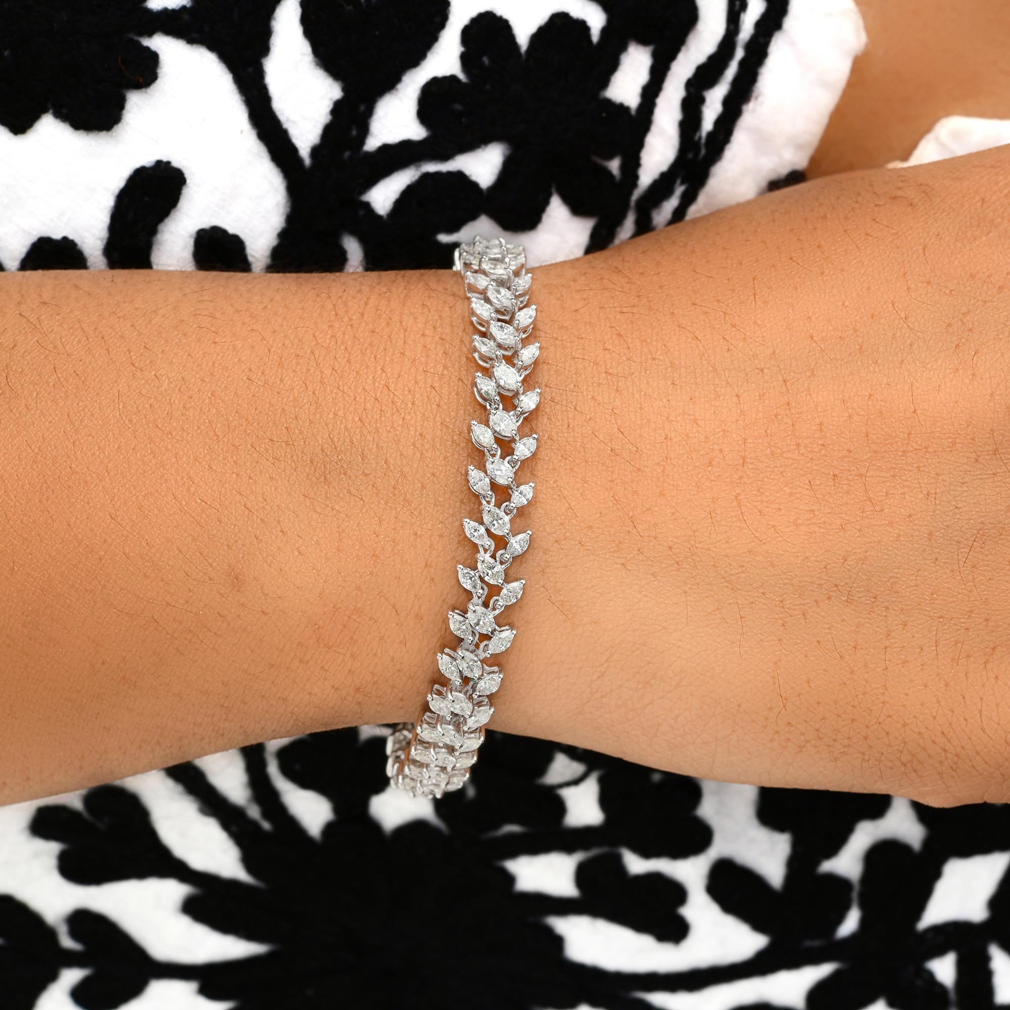 Bracciale di fidanzamento con diamanti marquise 6,45 carati SI/H Oro bianco 18 carati Tutte le tariffe pagate
Il bracciale è caratterizzato da diamanti taglio marquise incastonati in tripla fila e costituisce un bracciale tennis da matrimonio. Con