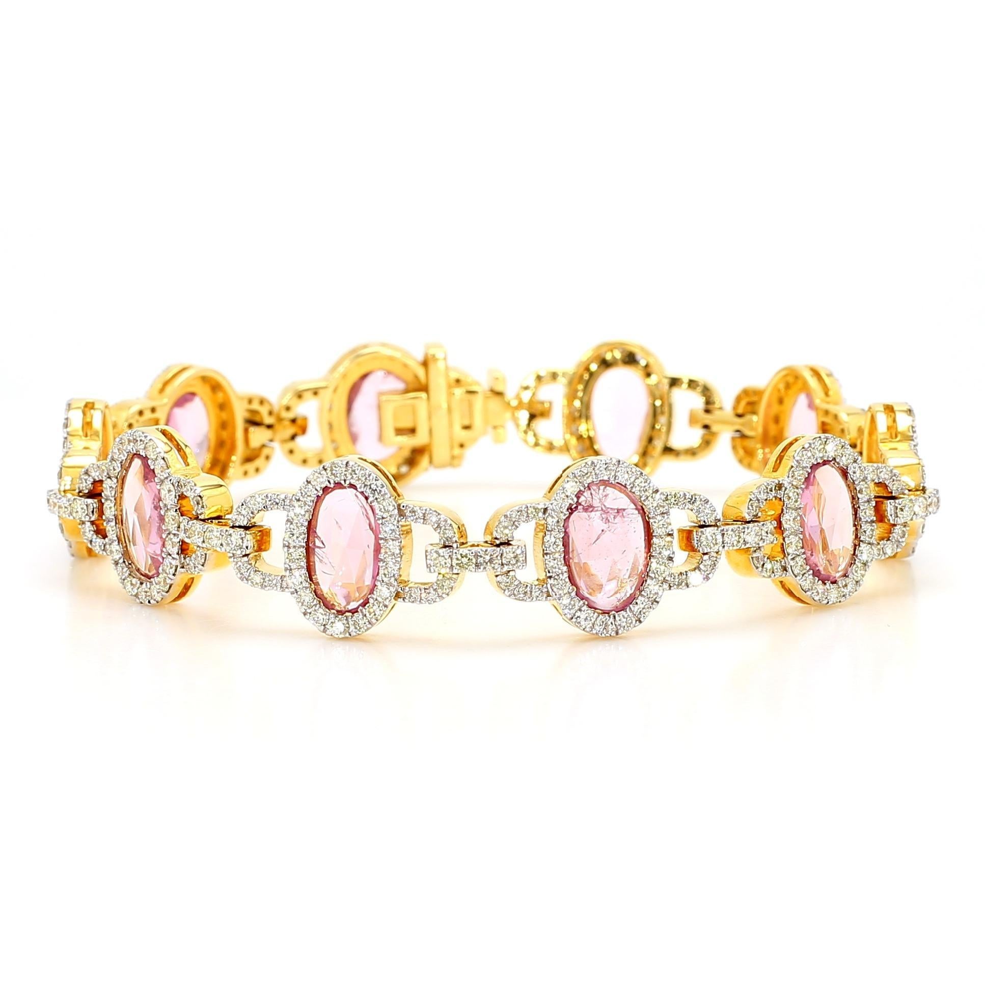 The Pink Sapphire Bracelet is a stunning piece of jewelry, featuring a captivating array of pink sapphires. Each stone is meticulously cut into an elegant oval shape, with a combined weight of 6.46 carats, showcasing their exquisite beauty and