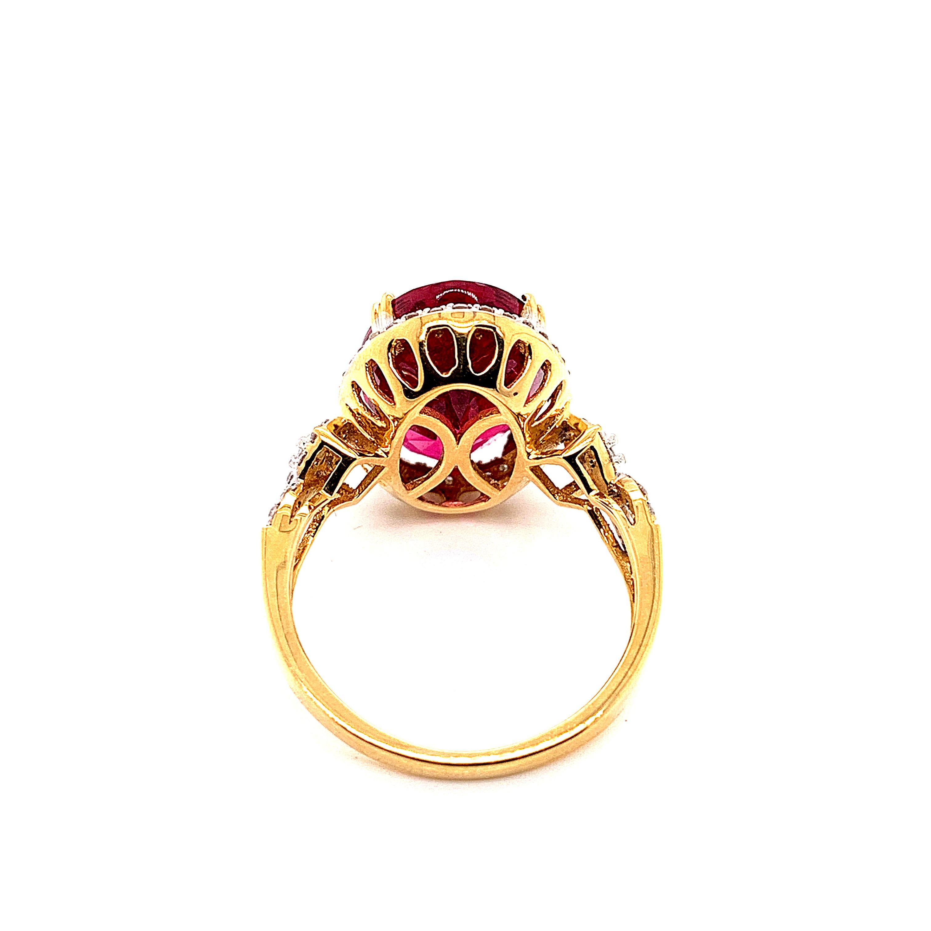 Women's 6.46 Carat Oval Shaped Rubelite Ring in 18 Karat Yellow Gold with Diamonds For Sale