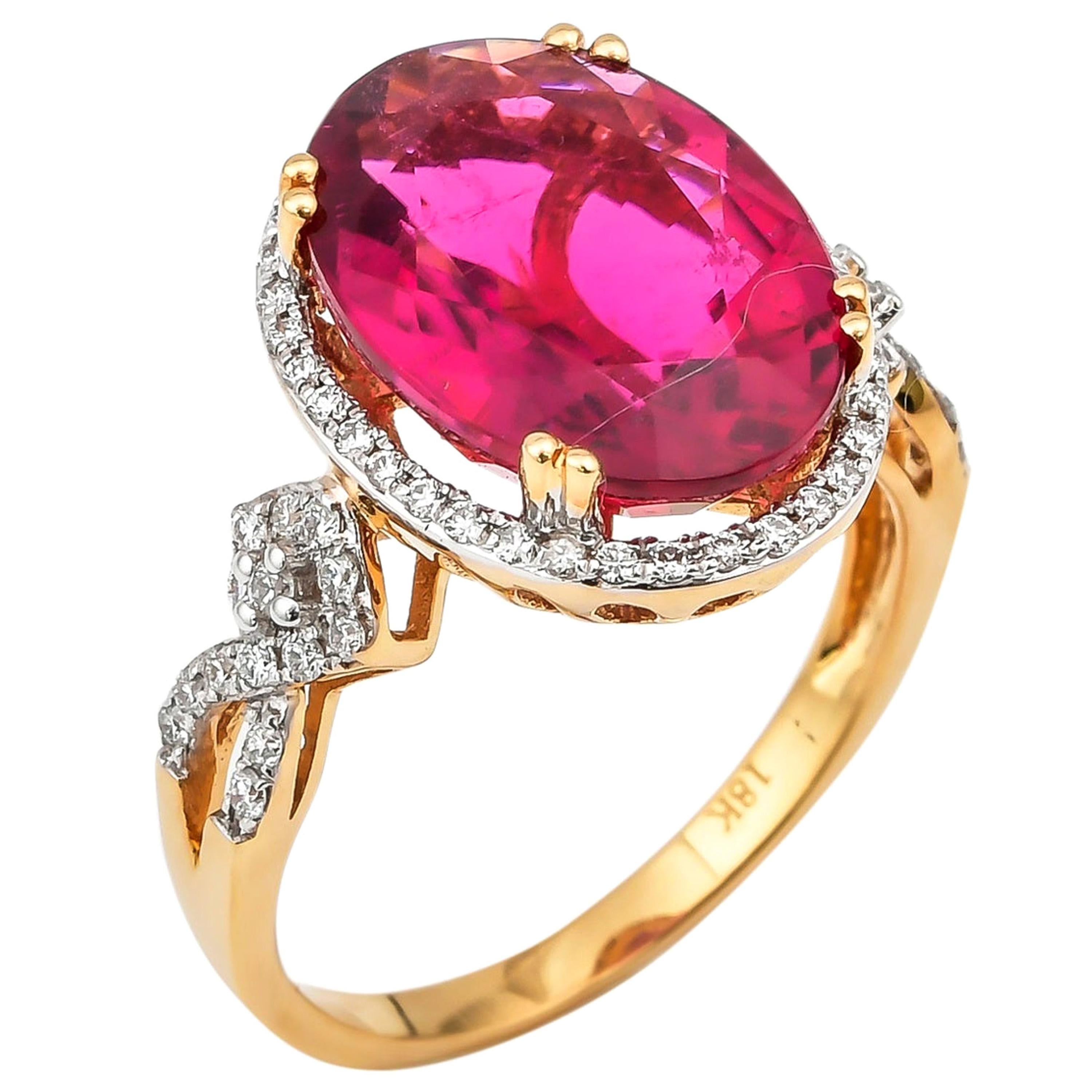 6.46 Carat Oval Shaped Rubelite Ring in 18 Karat Yellow Gold with Diamonds For Sale
