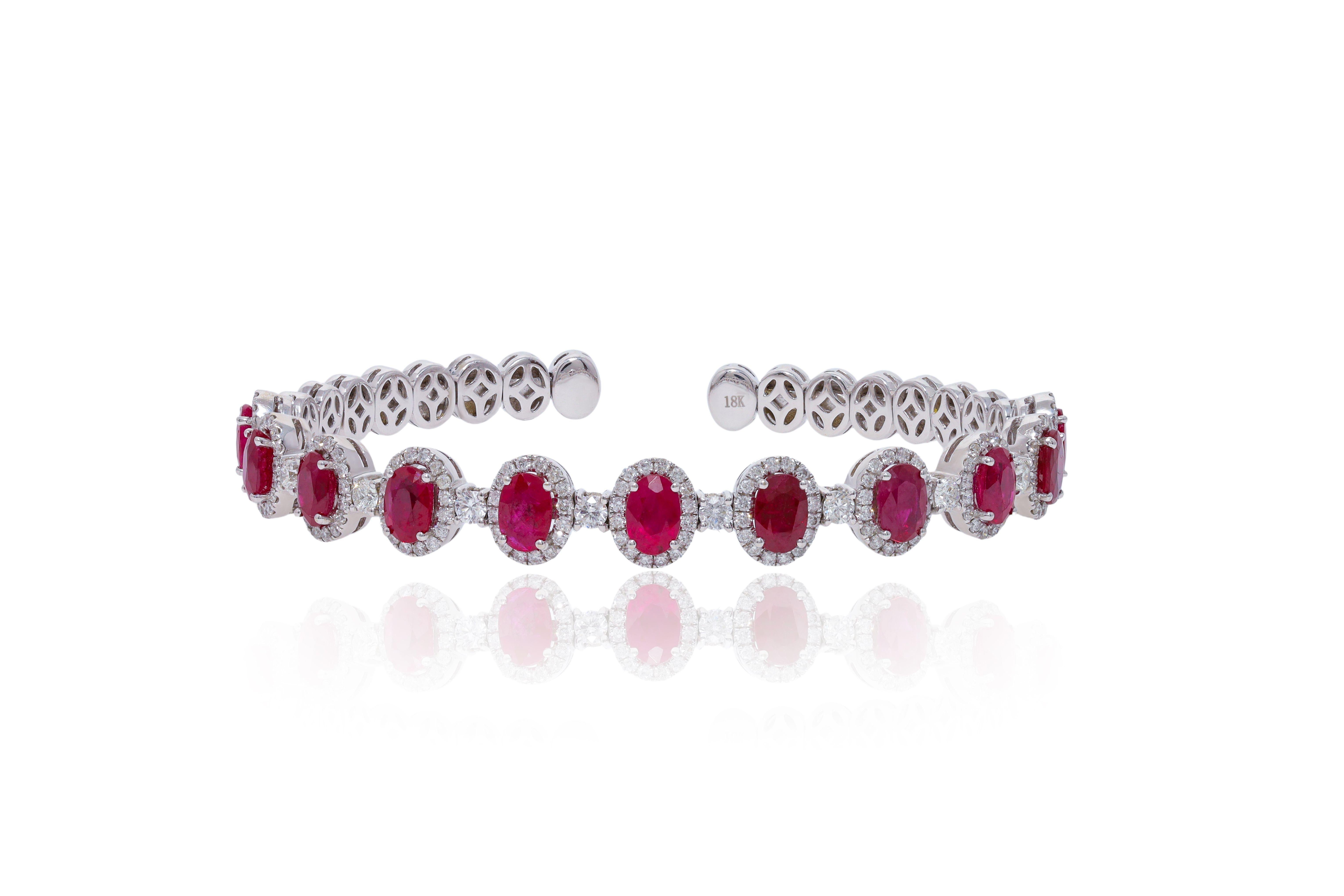 18 kt white gold ruby and diamond bracelet with 6.46 cts tw of rubies surrounded and separated by 1.92 cts tw of diamonds