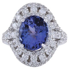 Bague exquise en or blanc 14 carats avec tanzanite naturelle et diamants 