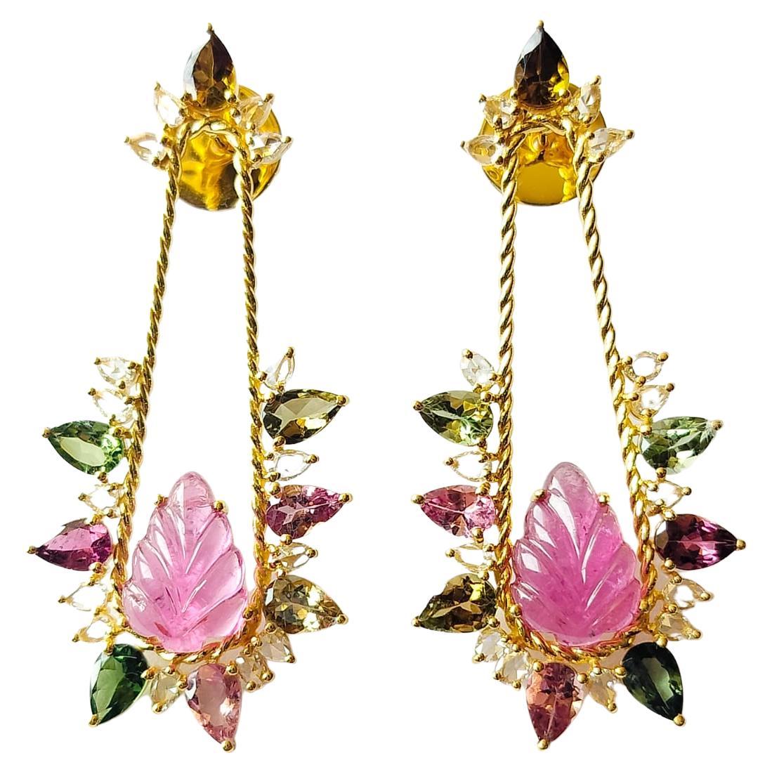 A very gorgeous and Art Deco style, Tourmaline and Multi Sapphire Chandelier / Dangle Earrings set in 18K Yellow Gold & Diamonds. The weight of the Tourmalines is 6.46 carats. The Tourmalines are hand carved in our very own workshop. The weight of