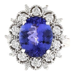 Élégante bague en or blanc 14 carats avec tanzanite naturelle et diamants 