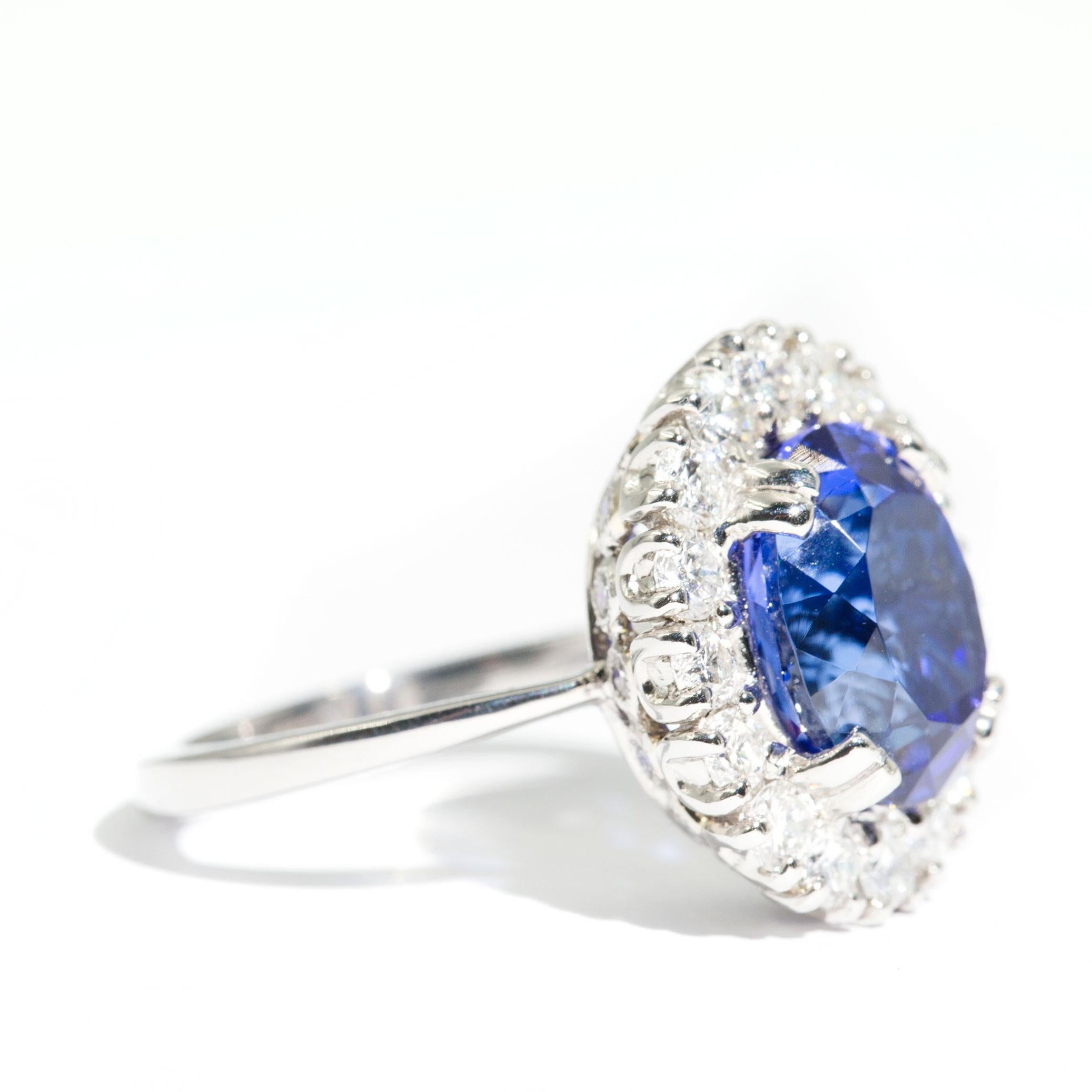 Contemporary 6.47 Carat Oval Flawless Tanzanite and 1.51 Carat Diamond Platinum Cocktail Ring For Sale