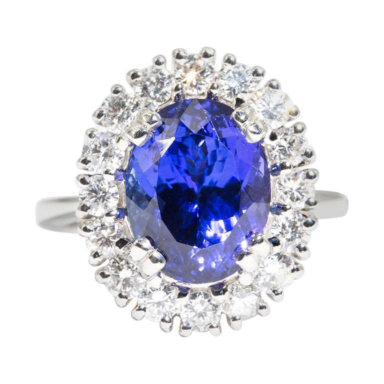 6.47 Carat Oval Flawless Tanzanite and 1.51 Carat Diamond Platinum Cocktail Ring For Sale