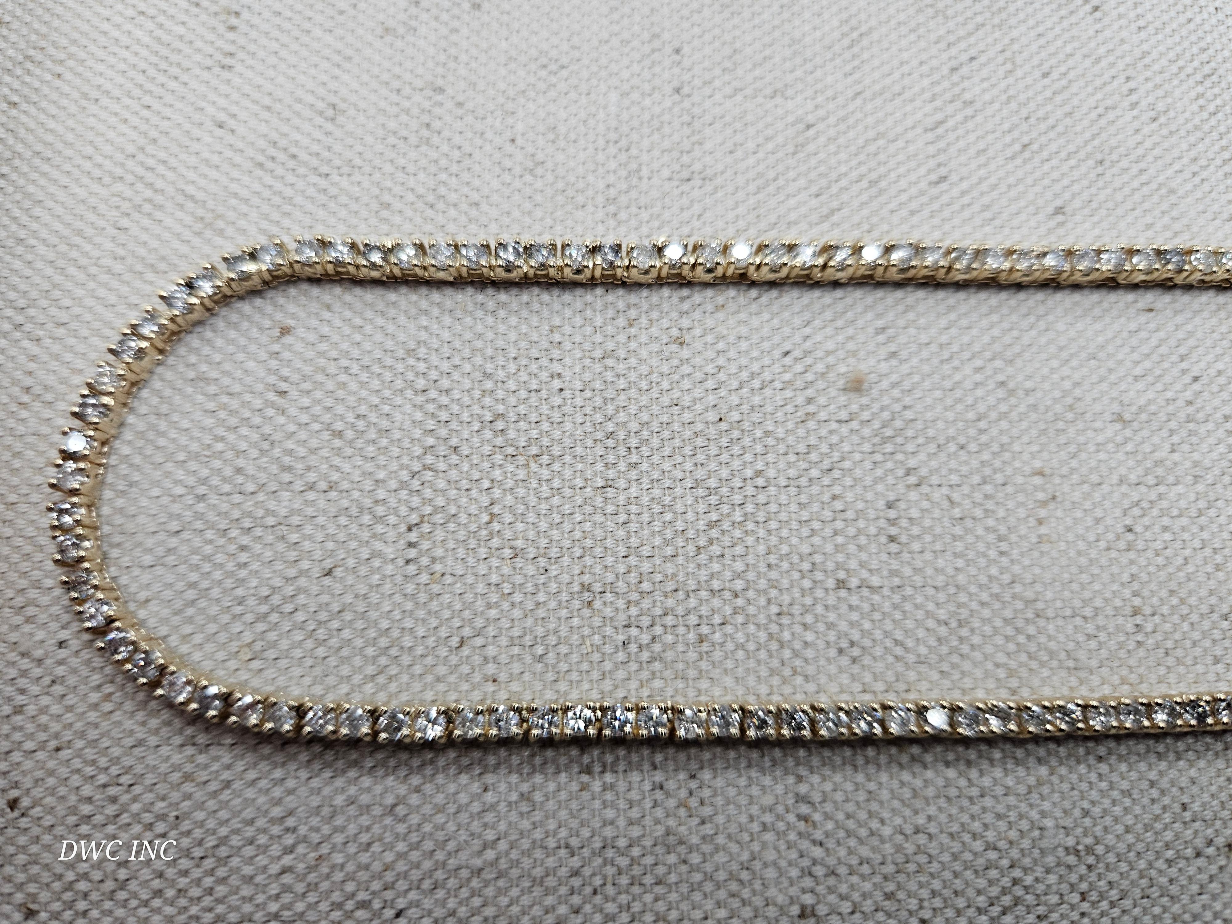 Beautiful quality tennis necklace, round-brilliant cut white diamonds and Excellent shine. 
14k yellow gold classic four-prong style for maximum light brilliance. 
16 inch length Average Color F, Clarity I, 2.7 mm wide 20.75 grams
