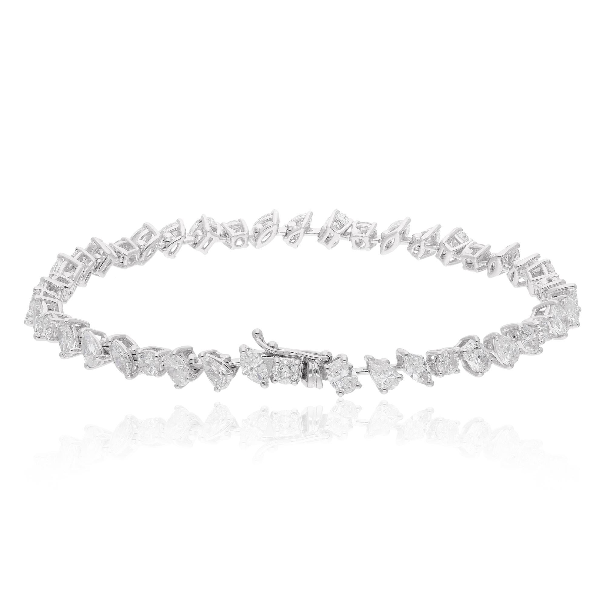 Embrace the epitome of luxury and elegance with this breathtaking 6.48 carat multi-shape diamond bracelet, meticulously handcrafted in radiant 14 karat white gold. A true masterpiece of fine jewelry, this bracelet exudes opulence and sophistication,