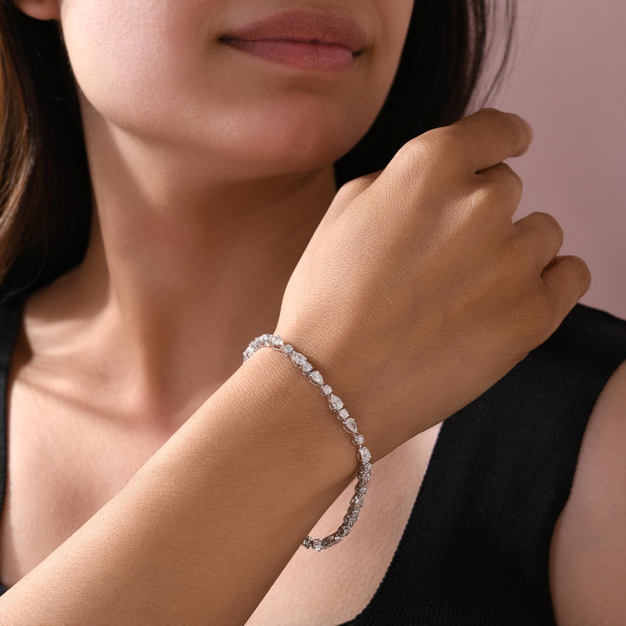 6,49 Ct Multi Cut Certified Diamond Tennis Armband 18K Weißgold Feiner Schmuck
Dieses elegante Tennisarmband zeichnet sich durch ein exquisites, abwechselndes Muster aus simulierten Diamanten im Birnen- und Rundschliff aus, die ein zeitloses und