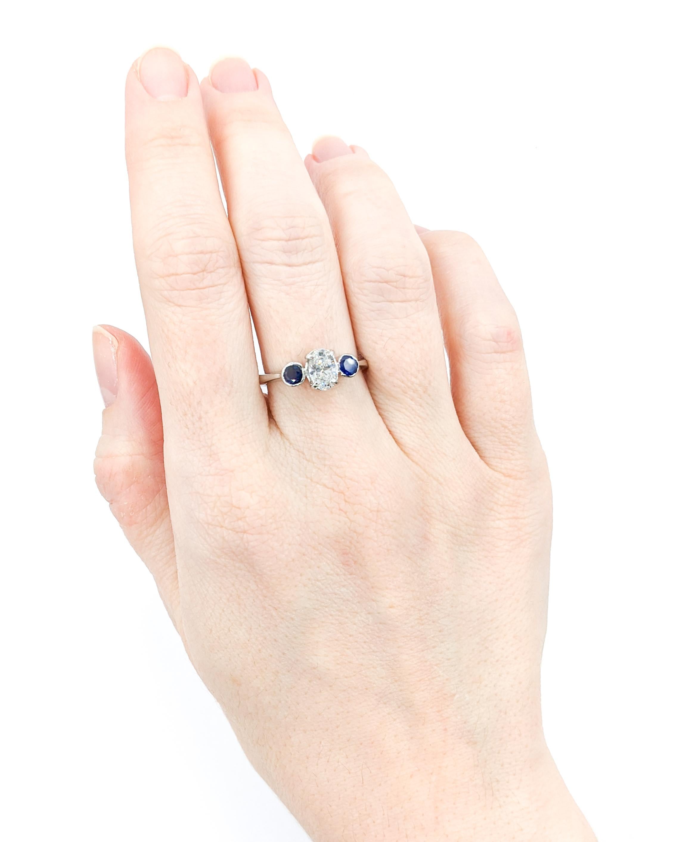 Contemporary .64ct Diamond & Blue Sapphire Ring In Platinum For Sale