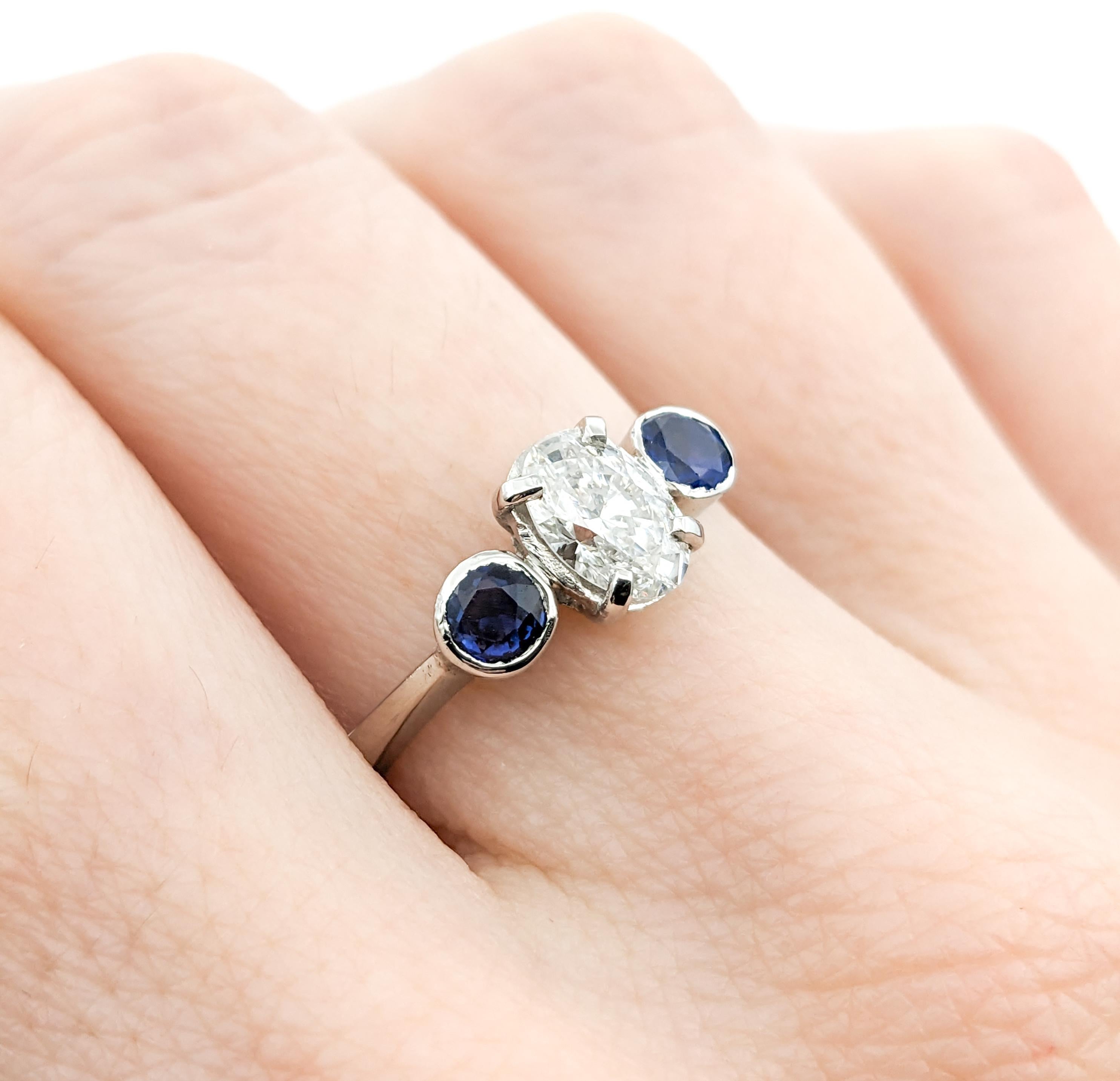Oval Cut .64ct Diamond & Blue Sapphire Ring In Platinum For Sale
