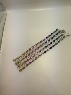64ct Rainbow sapphire cuff bracelet 14kt gold