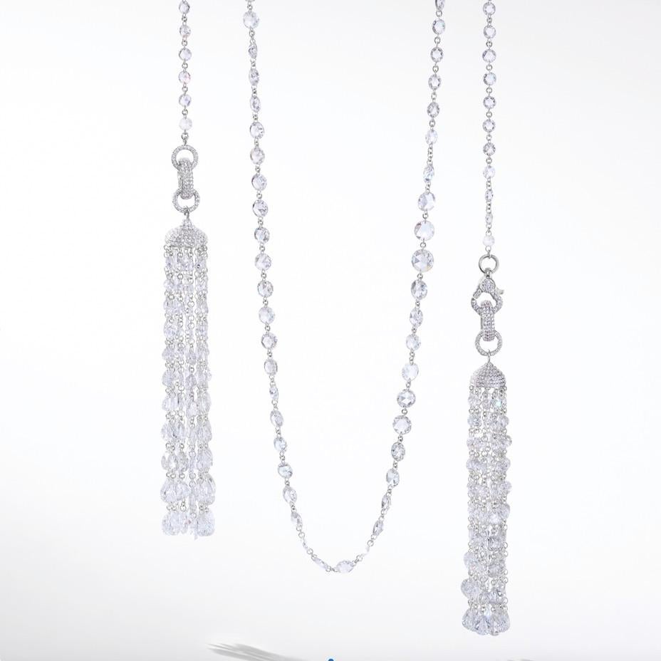 64Facets' rose cut diamond tassels offer endless combinations of sophistication and versatility. 14 carats of shimmering rose cut diamonds are held delicately together from our signature micro pave set cap, this attachable tassel can transform into