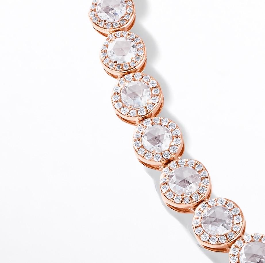 The 64Facets Scallop Diamond Necklace embodies the romanticism that diamond jewelry has evoked for hundreds of years.

Each rose-cut diamond is hand-cut and accented by a ring of brilliant cut diamonds in a micro-pave setting to create a flow of