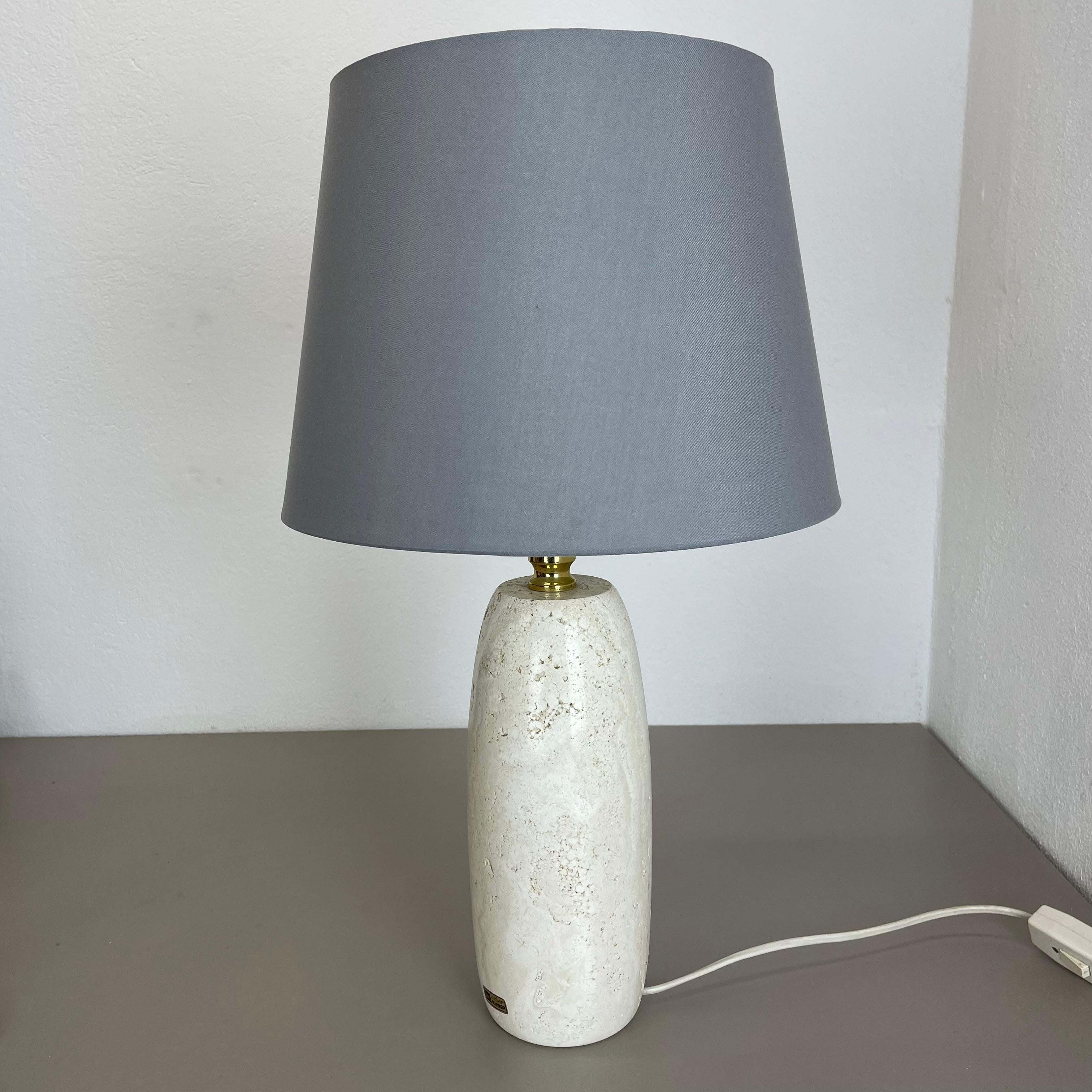 Article:

Impressive large travertine marble light base stand


Origin:

Italy (was sold on the germany market)


Decade:

1970s



Description:

This original vintage light base element is made of high quality travertine marble in a nice organic