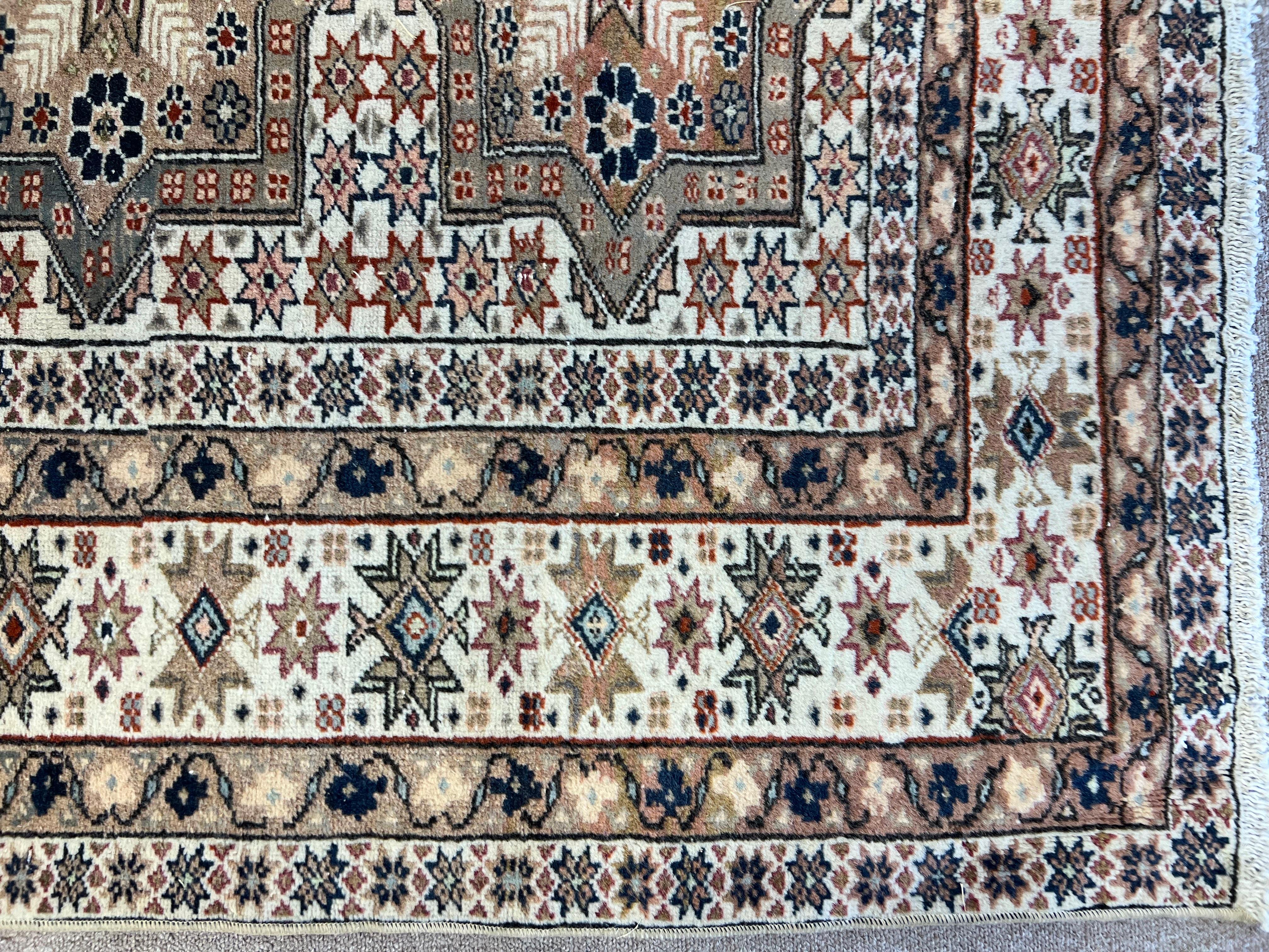 A finely hand knotted rug from Central Anatolia with soft colors and well drawn design.
Medium wool pile on cotton foundation.
Very good condition. Sturdy and as clean as a brand new rug (deep washed professionally)