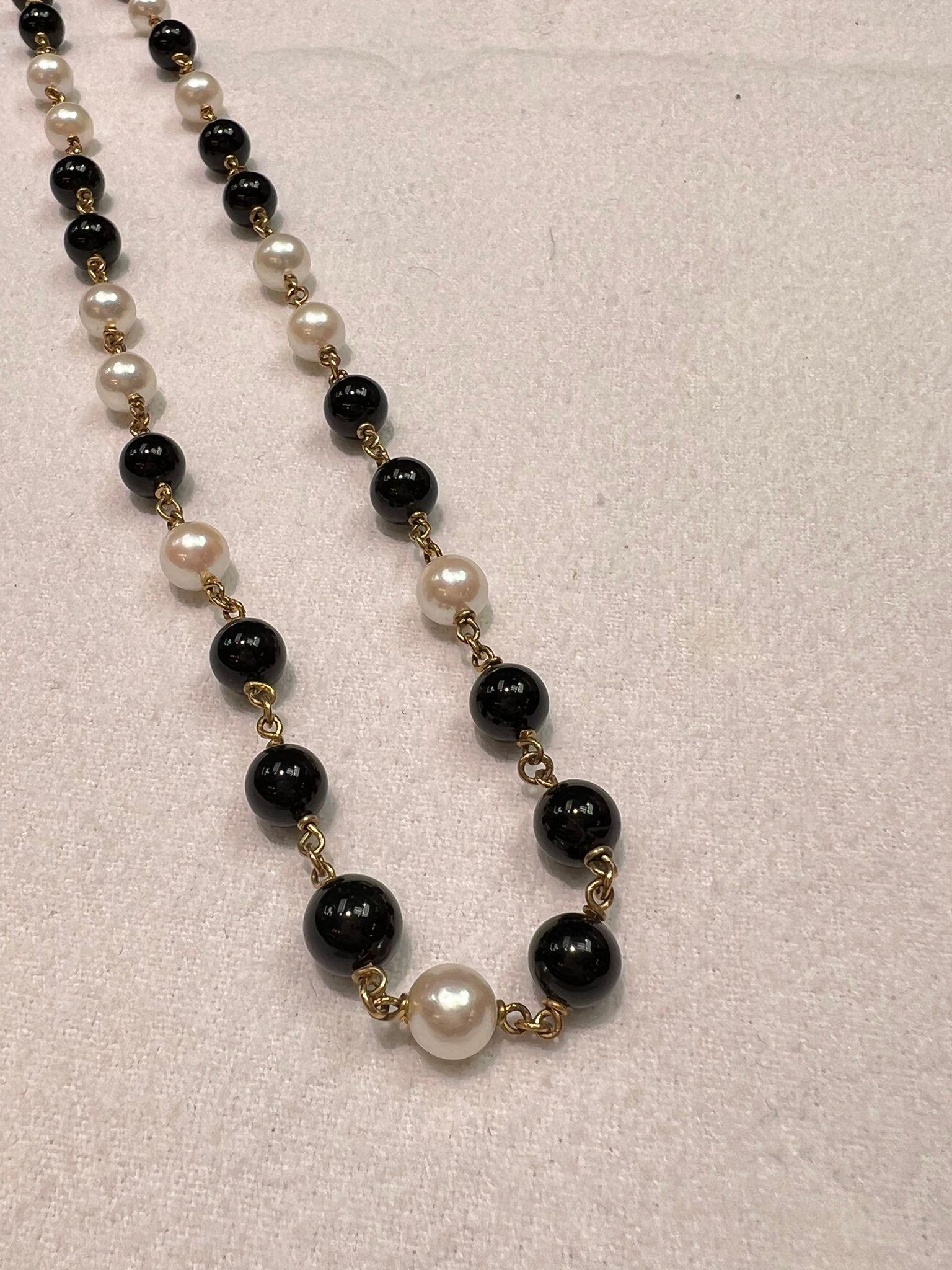 6.5-7mm Onyx and akoya pearls with silver chain and silver clasp 17.5 inches
