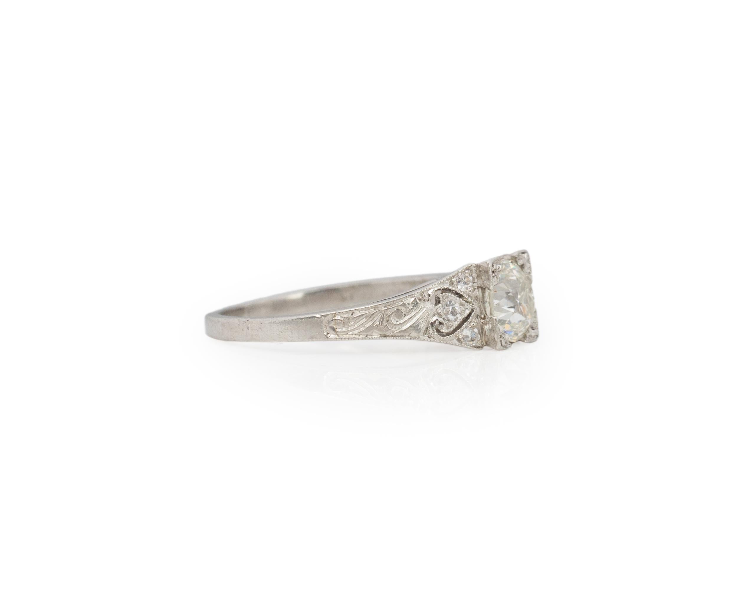 Ring Size: 5.5
Metal Type: Platinum [Hallmarked, and Tested]
Weight: 3.7 grams

Center Diamond Details:
Weight: .65ct
Cut: Old European brilliant
Color: I
Clarity: VS1

Side Diamond Details:
Weight: .10ct, total
Cut: Old European brilliant
Color: