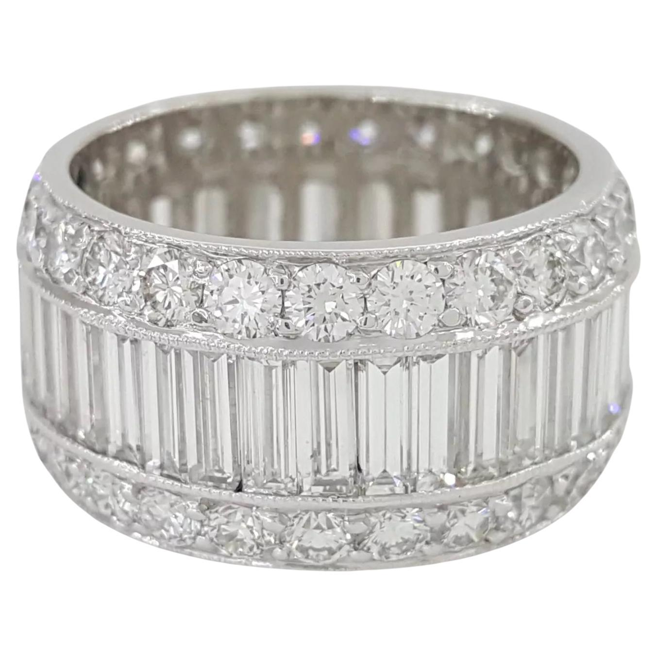 6.5 Carat Baguette & Round Brilliant Diamond Three-Row Eternity Wedding Band in Platinum

A bold and timeless statement, this exceptional three-row full circle eternity band features a dazzling combination of natural baguette and round brilliant cut